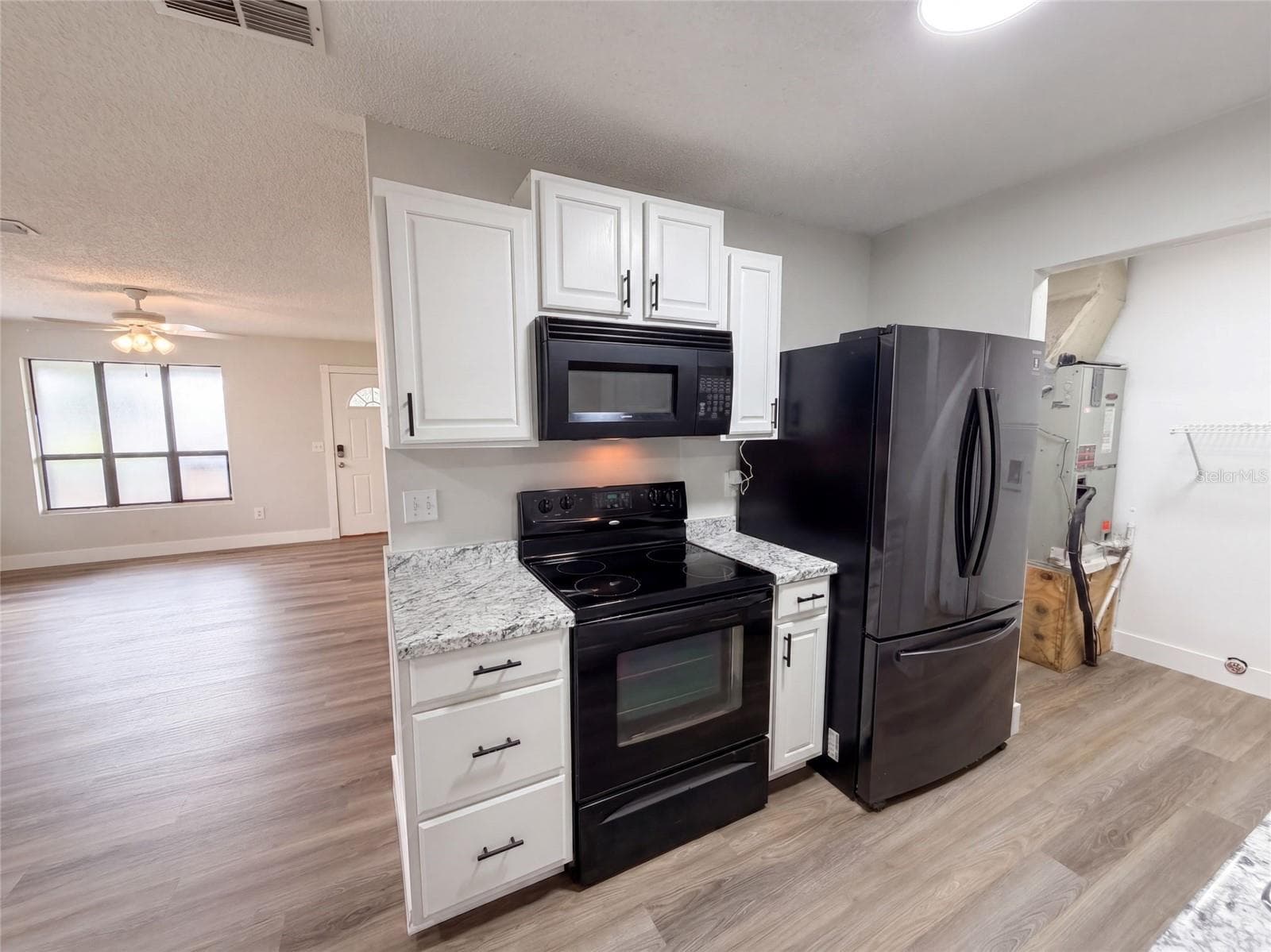 Single Family Residence at 9307 8TH AVE, ORLANDO, photo 11 of 32