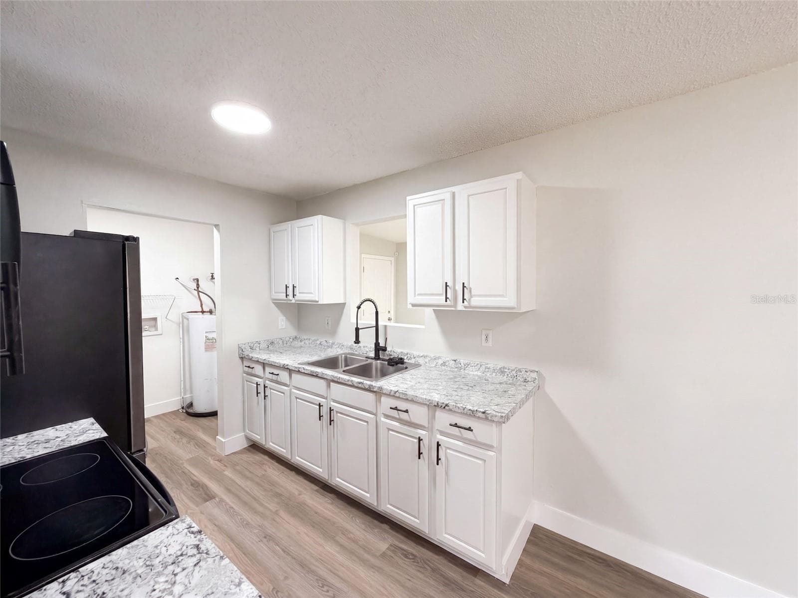 Single Family Residence at 9307 8TH AVE, ORLANDO, photo 12 of 32