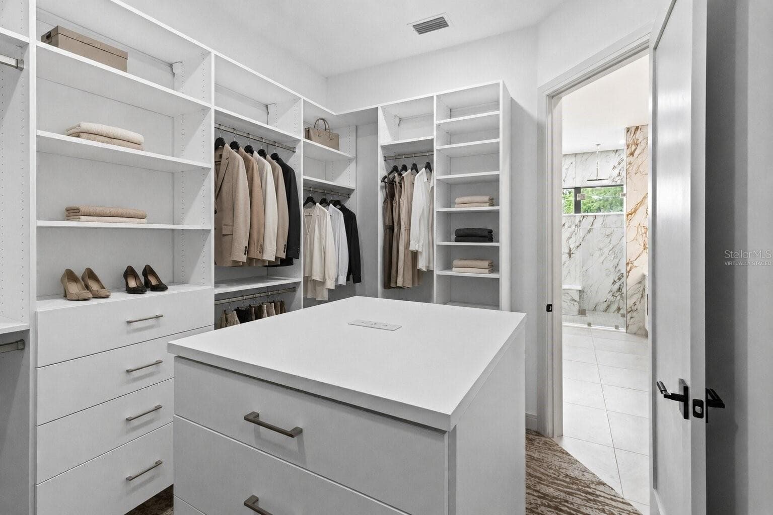 Virtually Staged Image of custom walk-in closet - 104 S MAKI RD, PLANT CITY