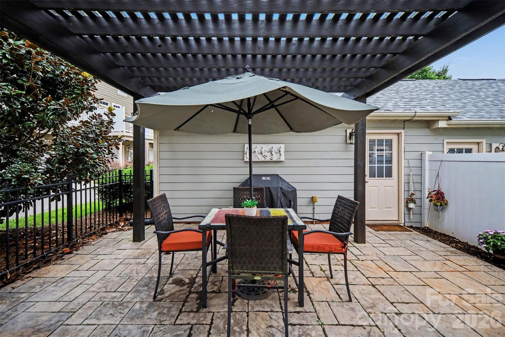 Largest courtyard the neighborhood!  Pavers, fountain, pergola, and privacy! - 438 Magnolia Street, Davidson