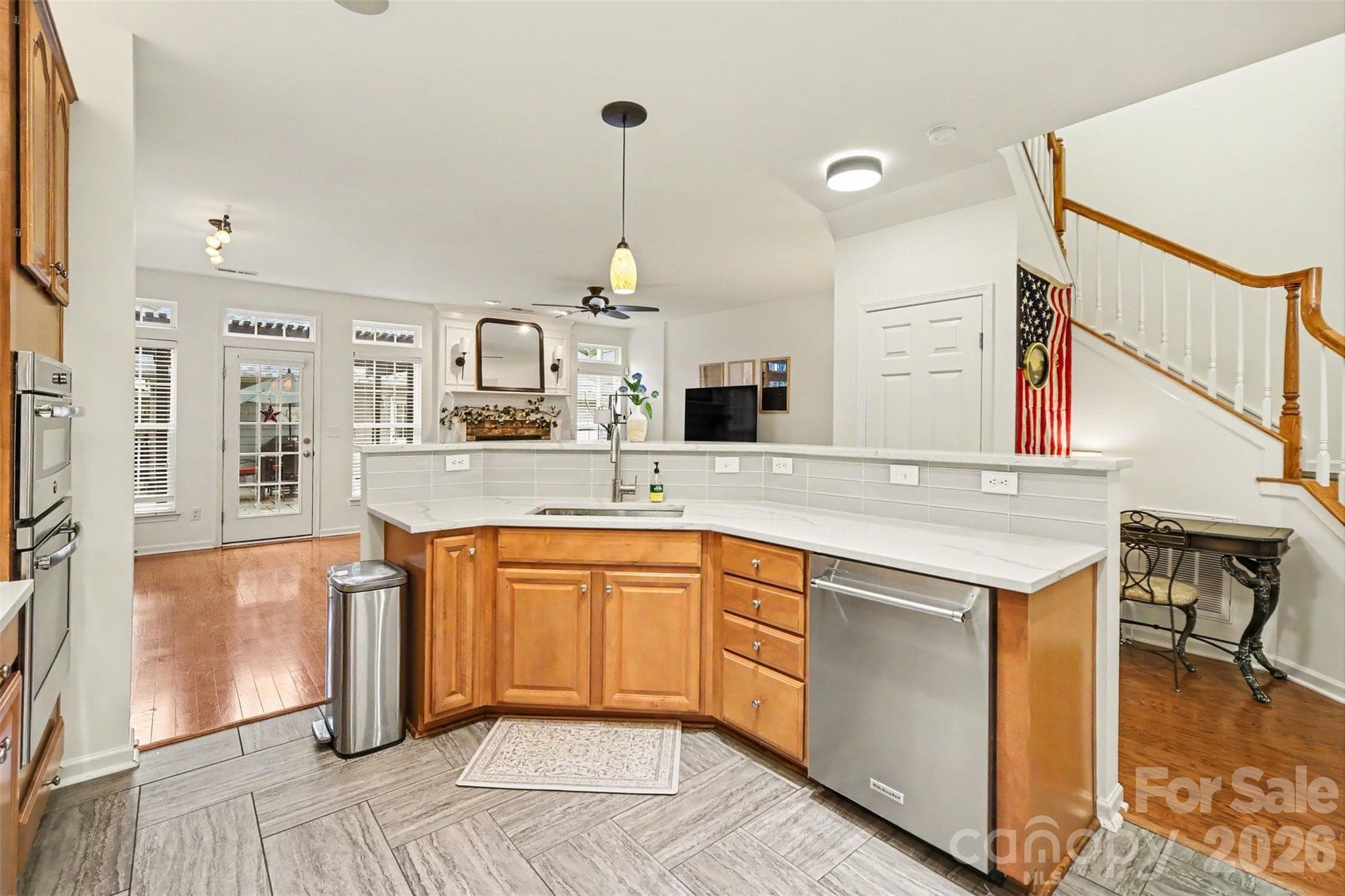 Open island/ bar area with stainless steel appliances. - 438 Magnolia Street, Davidson
