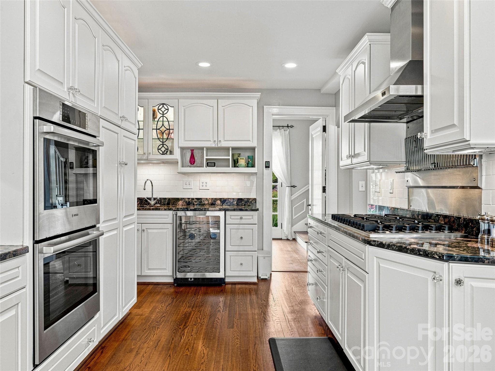 Bright, well appointed kitchen with abundant cabinetry and stainless appliances - 14 Griffing Boulevard, Asheville
