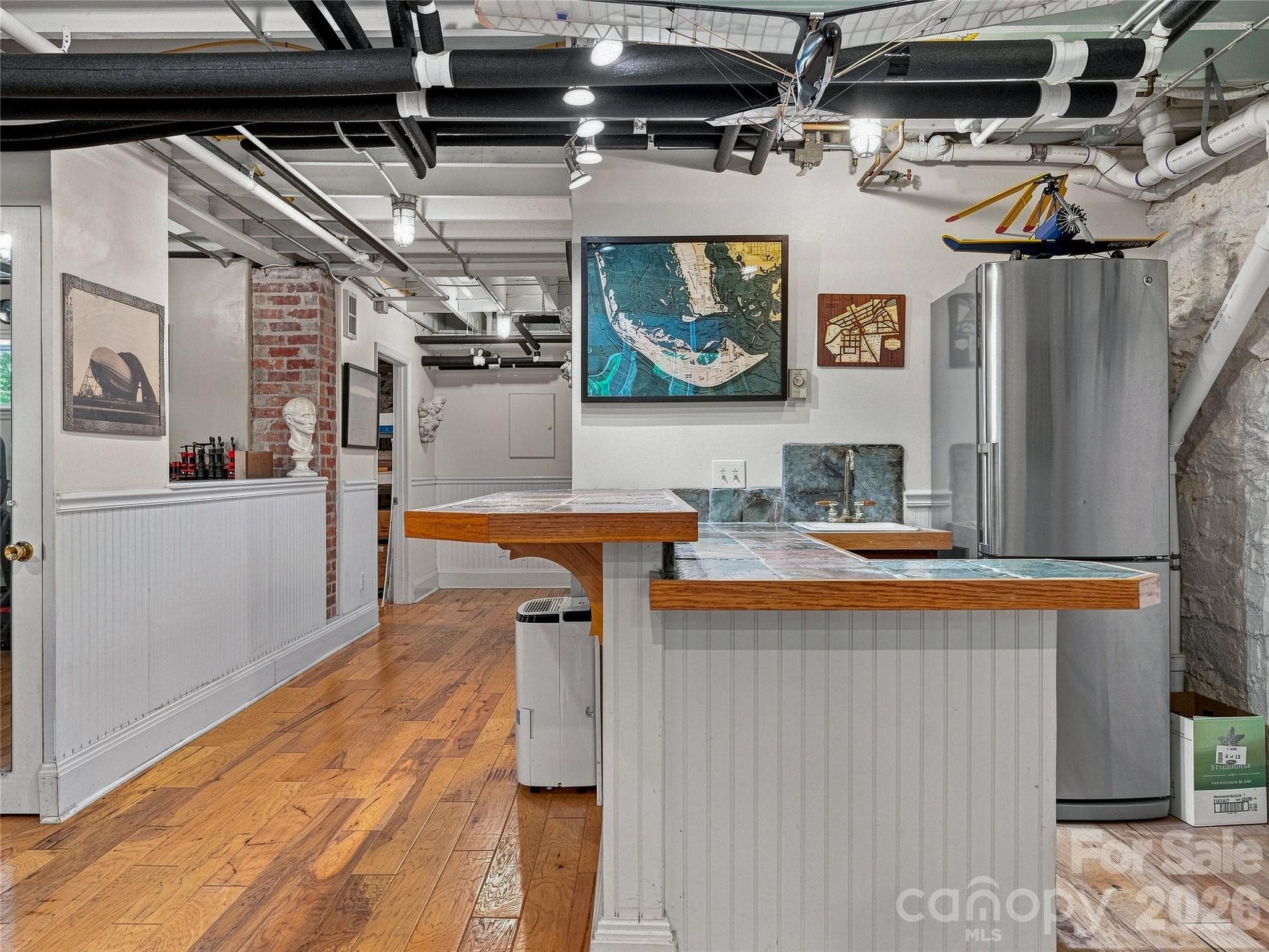 Lower level gathering space with refrigerator and sink! - 14 Griffing Boulevard, Asheville