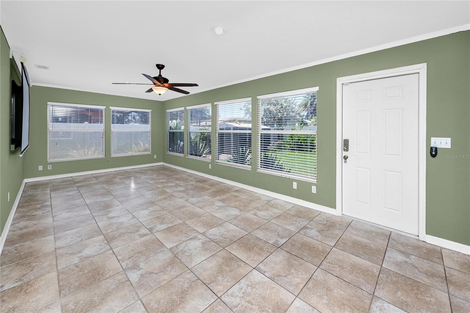 Bonus Room 26x12 leads to backyard - 1744 HARBOR CIR E, LARGO