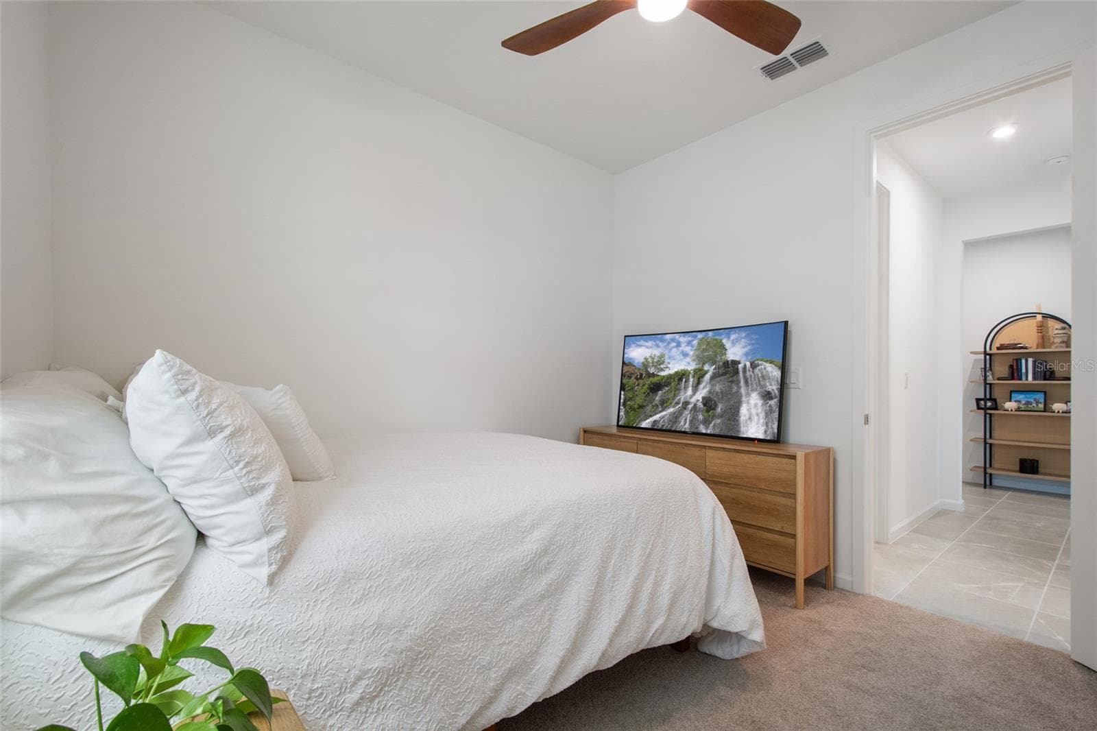 Bedroom 2 with view to foyer entrance. - 2685 SWEET ACACIA DR, CLERMONT