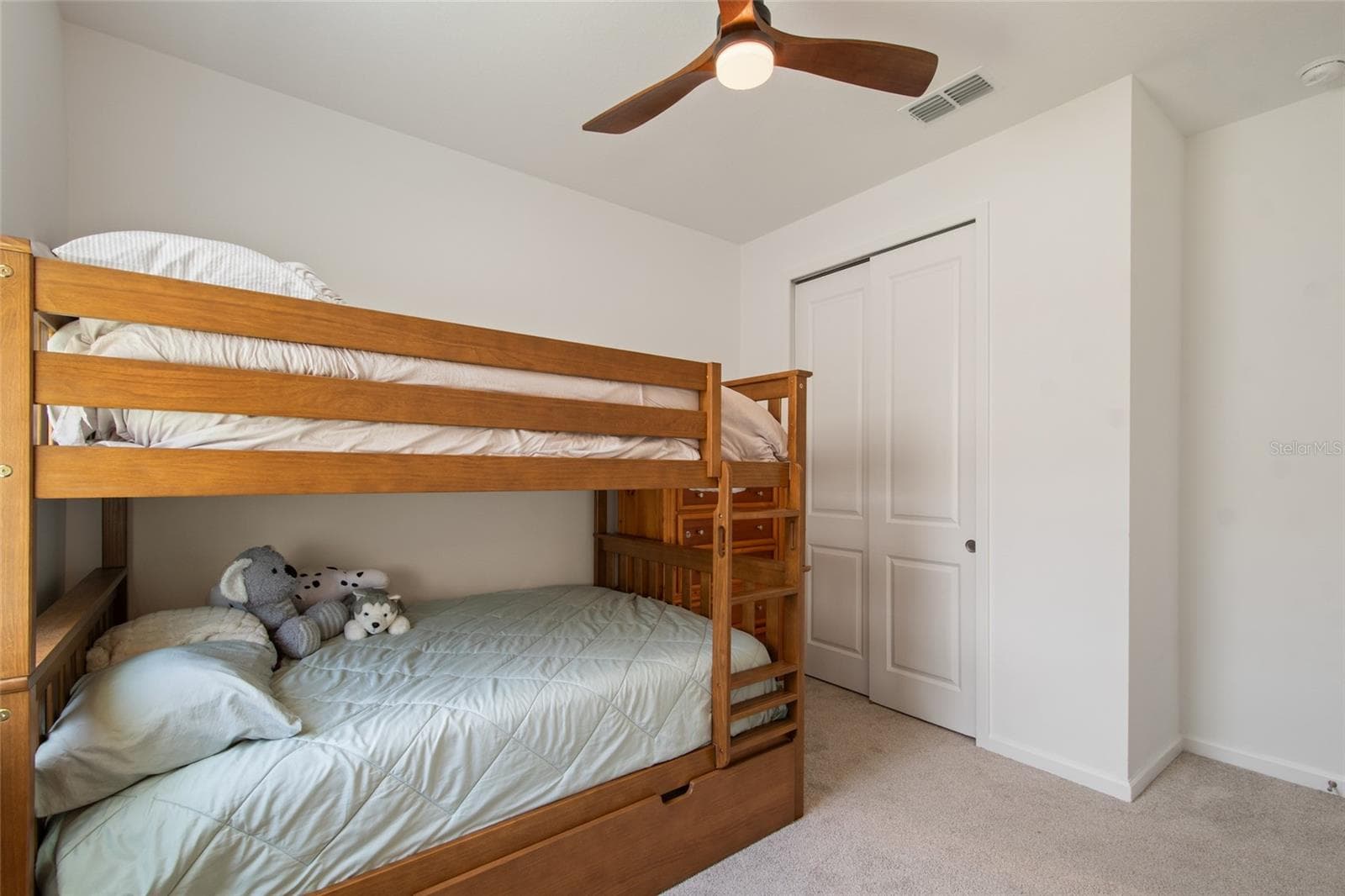 Bedroom 3 adjacent to Bathroom 2 and Bedroom 2 off the foyer. - 2685 SWEET ACACIA DR, CLERMONT
