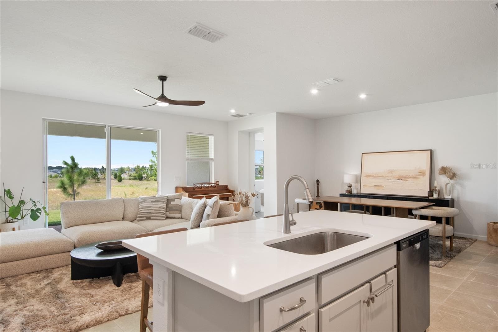 A vast expanse thought the sliding doors out the rear of home has a spectacular sunset view every day! - 2685 SWEET ACACIA DR, CLERMONT