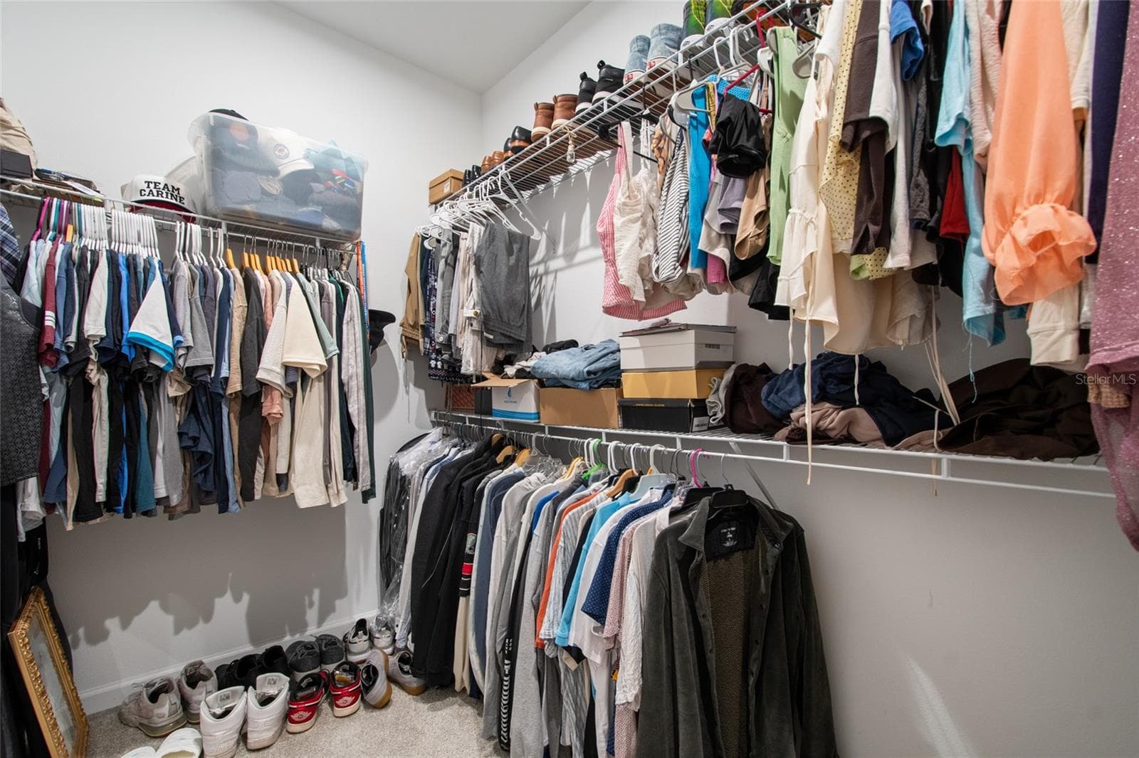 Tons of storage space, hanging and shelves for your bins or luggage to be situated and up and out of the way. - 2685 SWEET ACACIA DR, CLERMONT