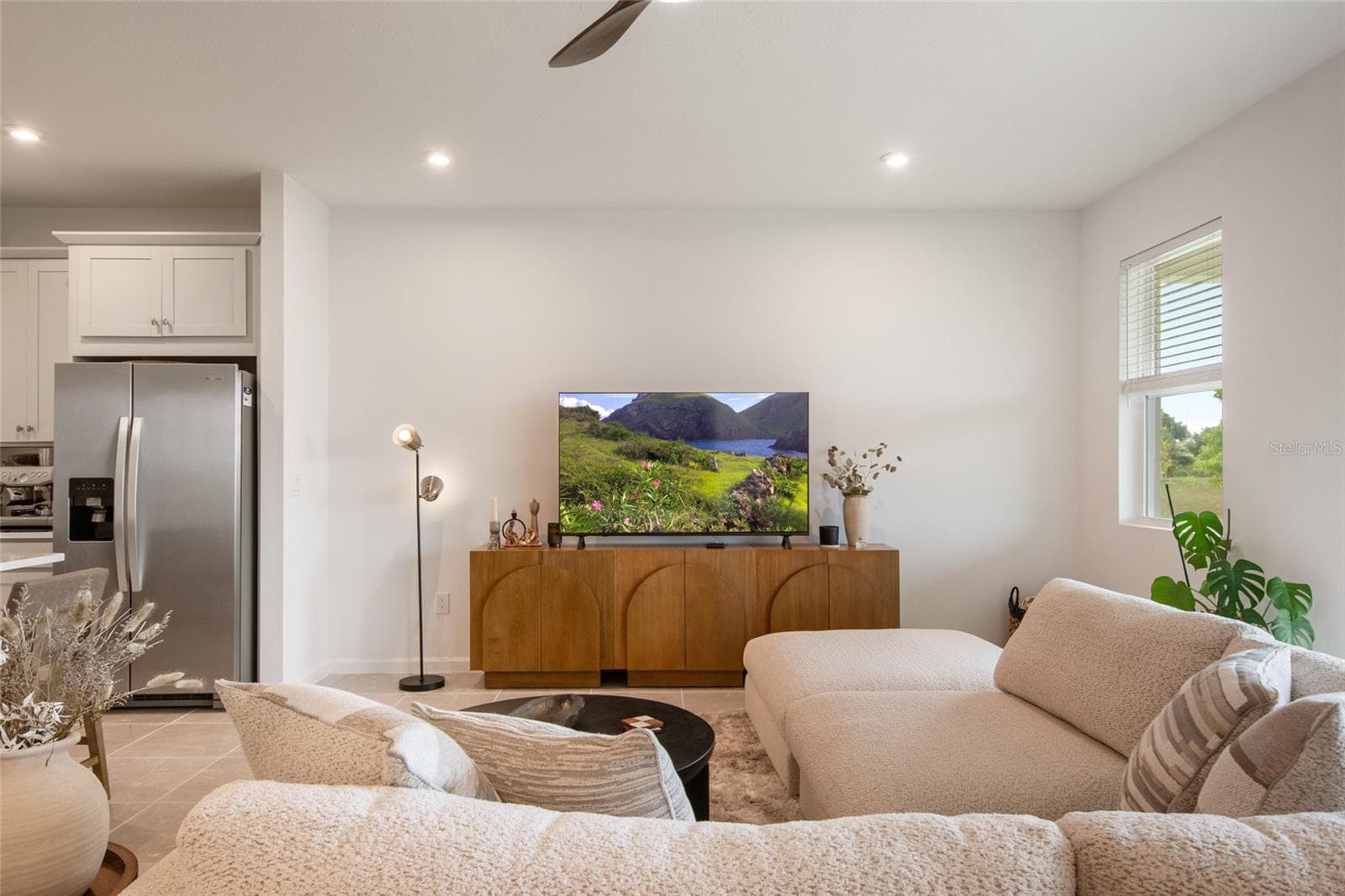 From the primary suite you are immediately accessed to the great room. - 2685 SWEET ACACIA DR, CLERMONT