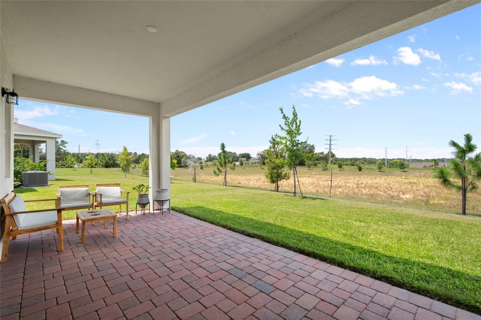 Generously sized you could add additional seating or a dining table for outdoor fresco meals. - 2685 SWEET ACACIA DR, CLERMONT