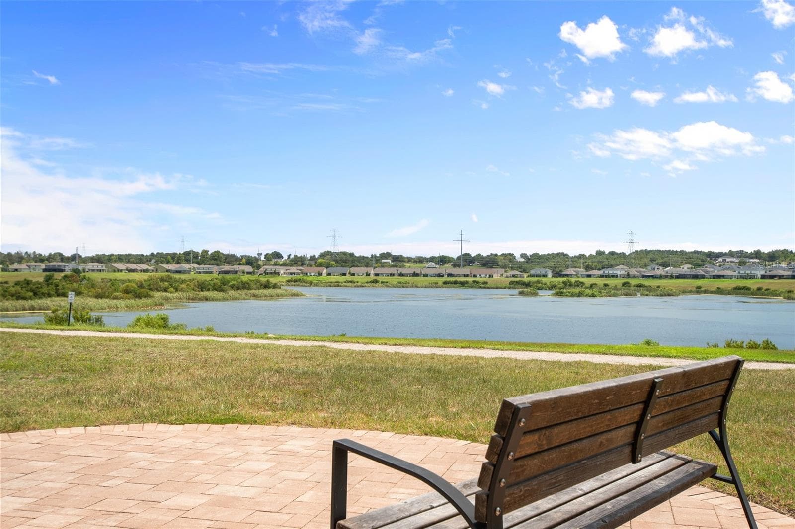 Sit a spell and enjoy the view off one of the walking paths - 2685 SWEET ACACIA DR, CLERMONT