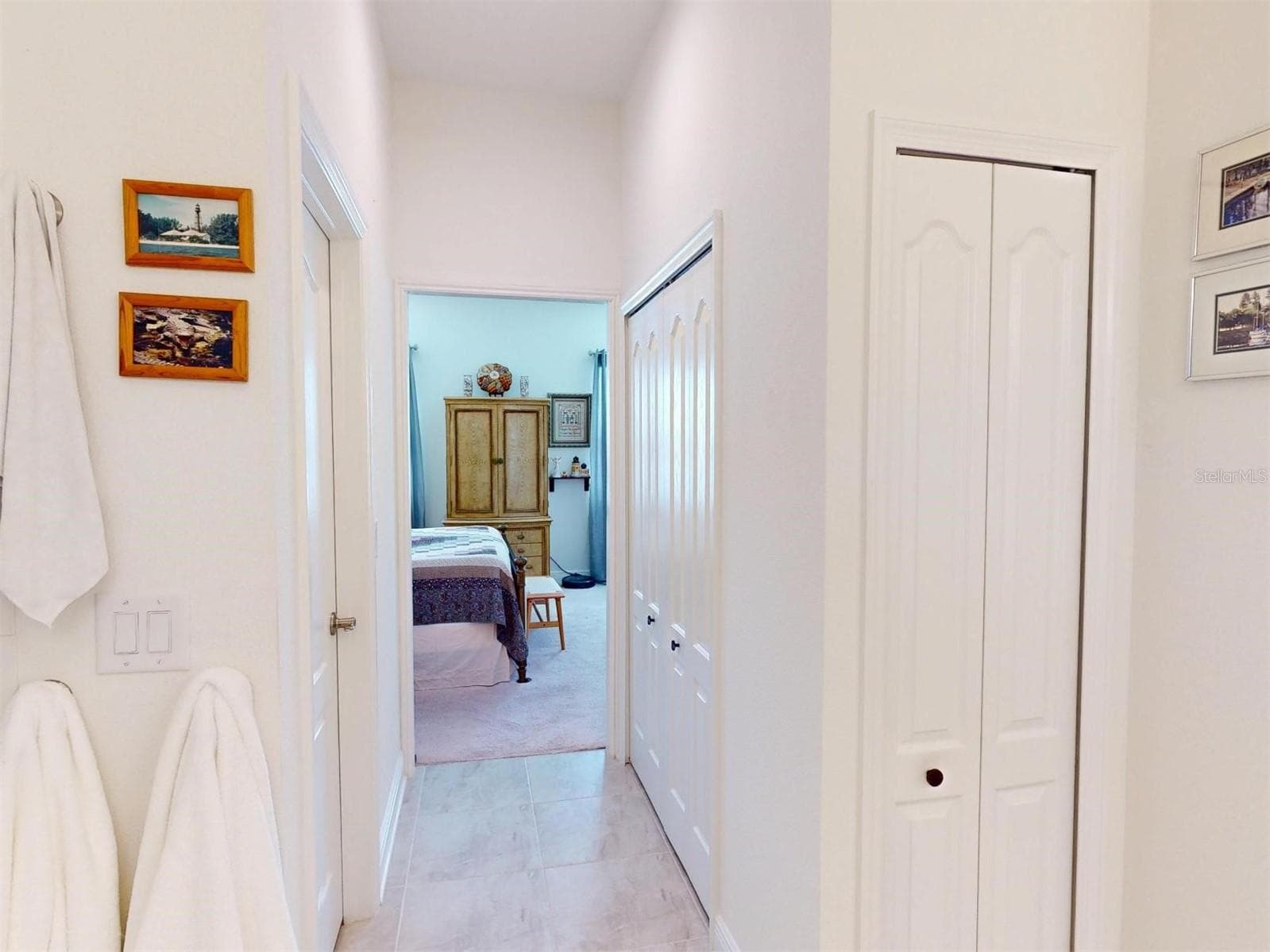 hall way with two closets one on each side - 24313 WESTGATE BLVD, PORT CHARLOTTE