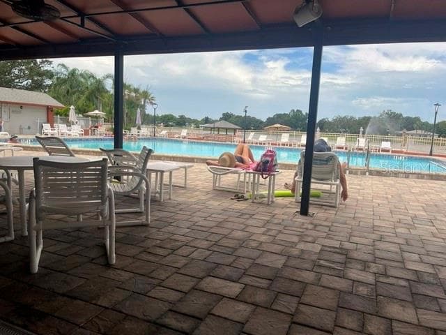 Pouch at pool - 11414 STANSBERRY DR, PORT RICHEY