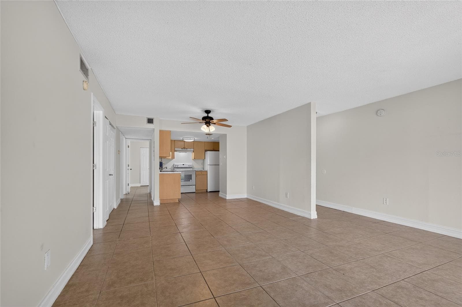 Open Space Living Room/Dining Room open to Kitchen - 3461 CLARK RD #160, SARASOTA