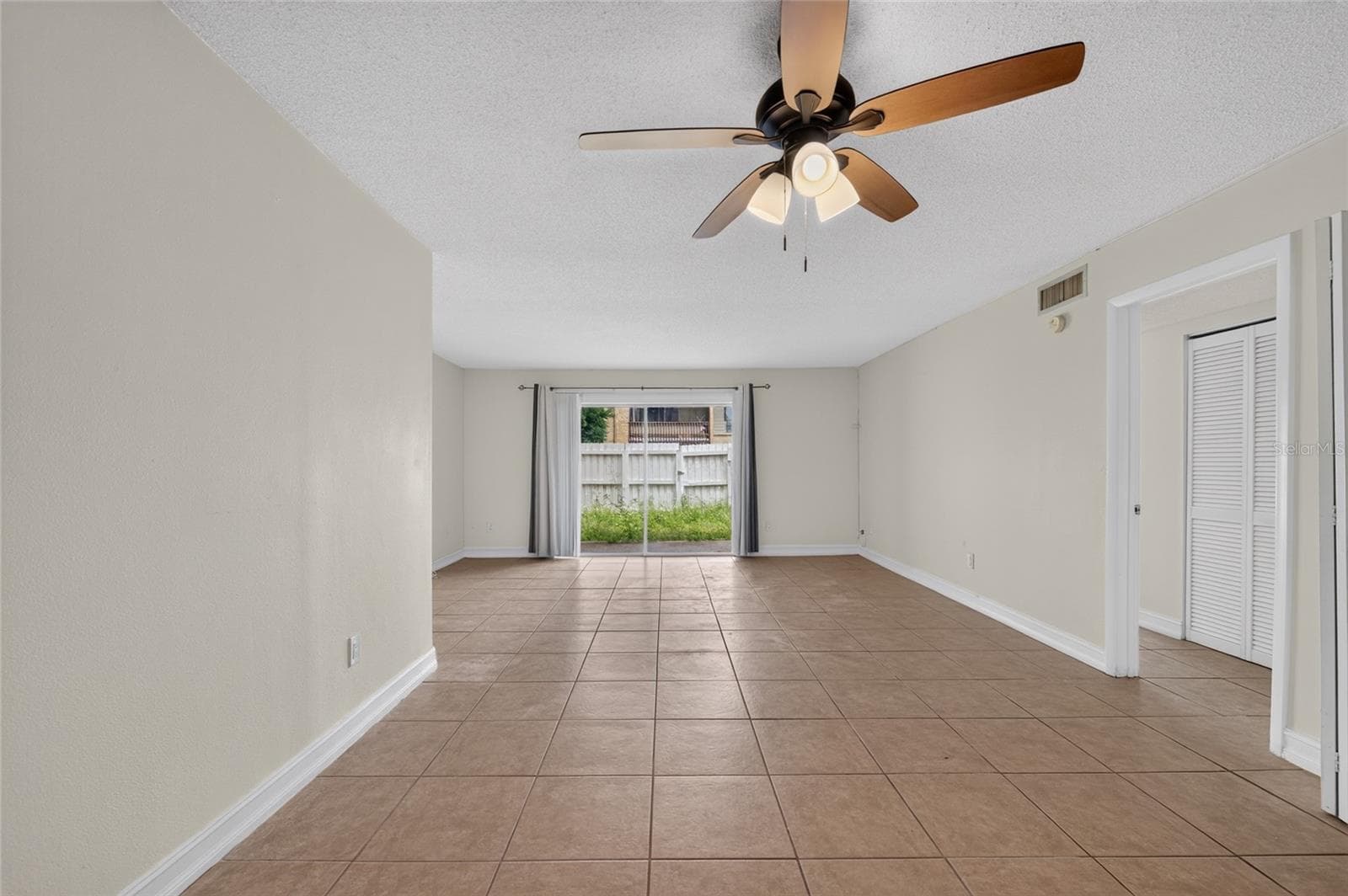 Looking out to Private Fenced area from Kitchen - 3461 CLARK RD #160, SARASOTA