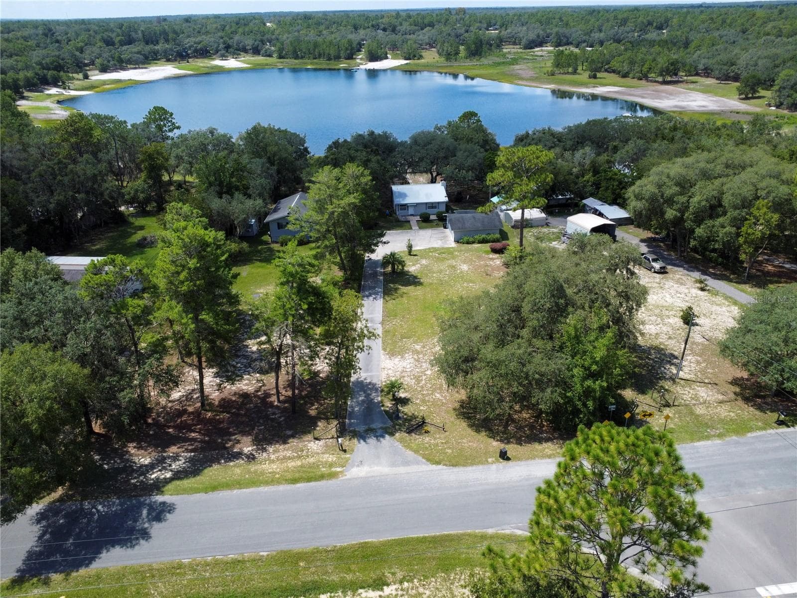 120'+ long paved driveway from Silver Sands Circle - 5616 SILVER SANDS CIR, KEYSTONE HEIGHTS