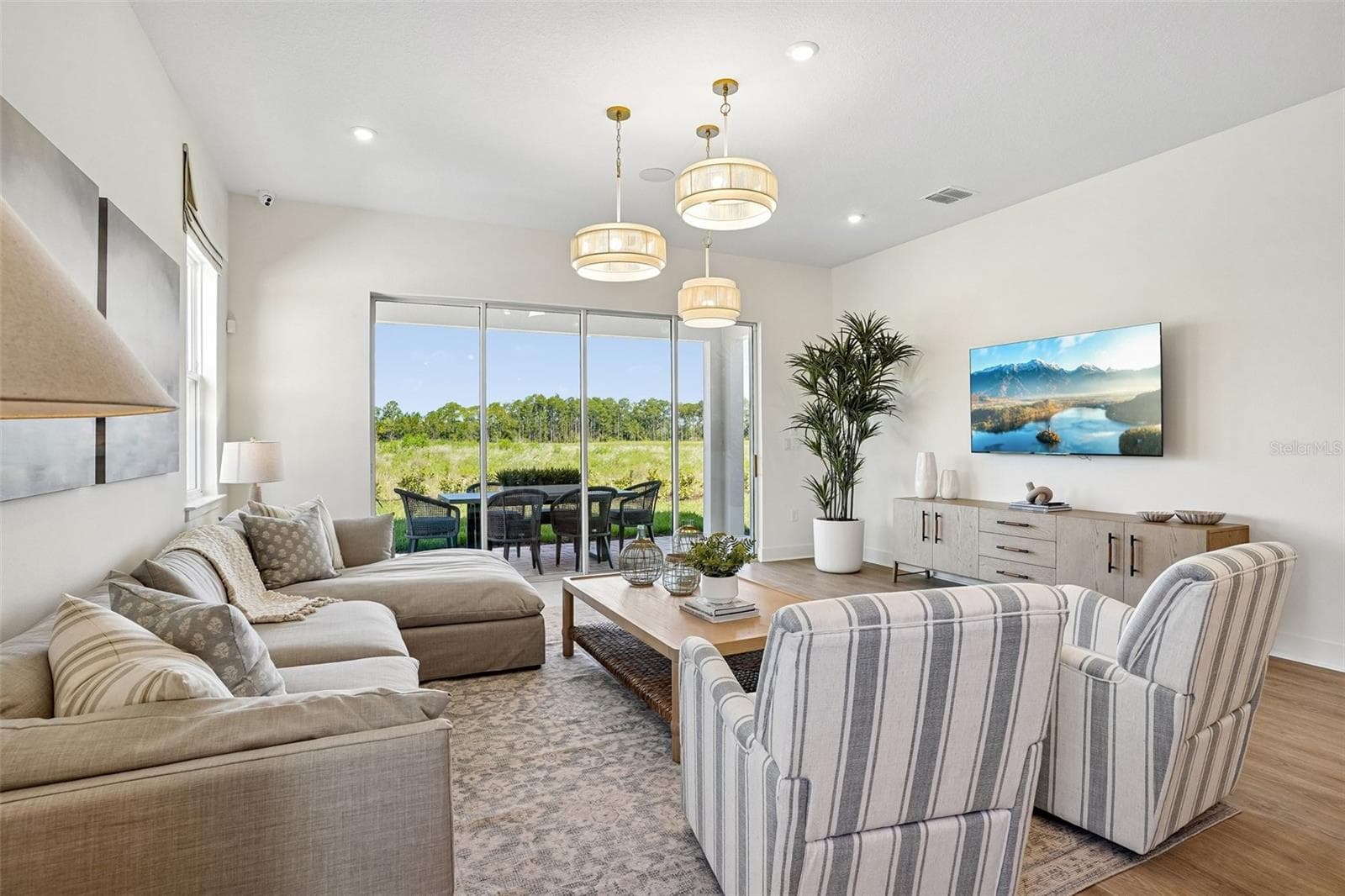 Living Room (representative photo) - 17428 HONEYBELL TANGELO CT, WINTER GARDEN