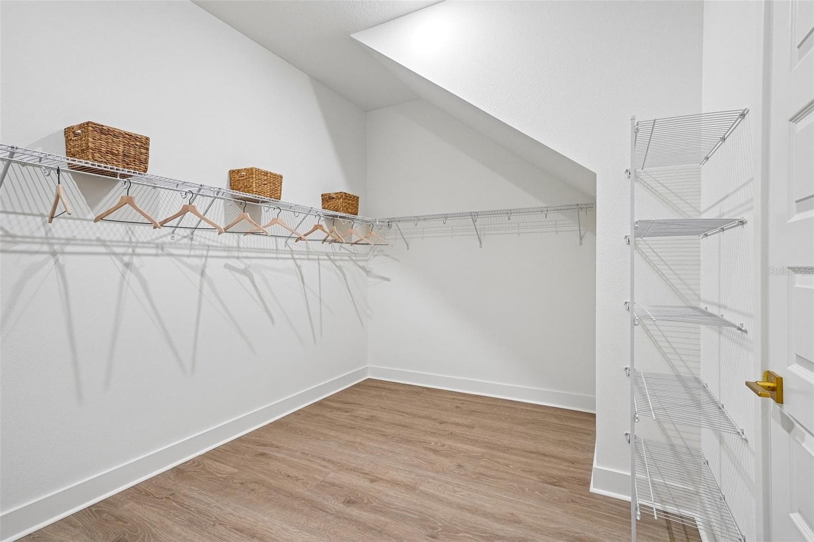Primary Closet (representative photo) - 17428 HONEYBELL TANGELO CT, WINTER GARDEN