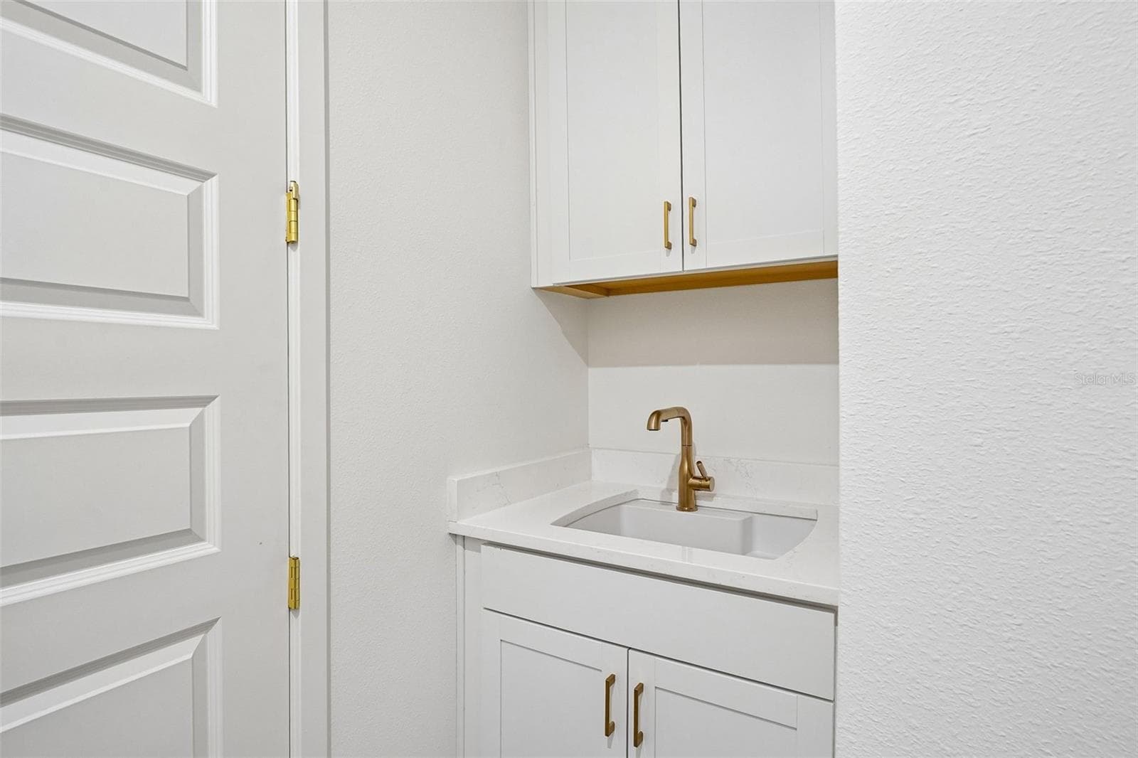 Laundry room (representative photo) - 17428 HONEYBELL TANGELO CT, WINTER GARDEN