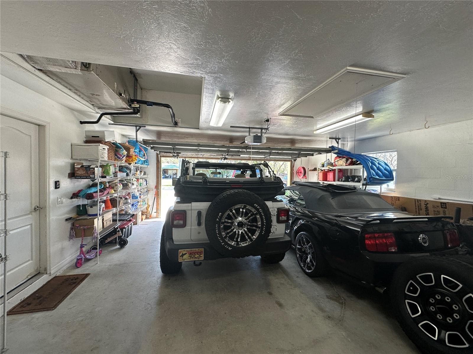 2 car garage with shelving & sink - NORTH PORT CHARLOTTE ESTATES ADD 02, NORTH PORT