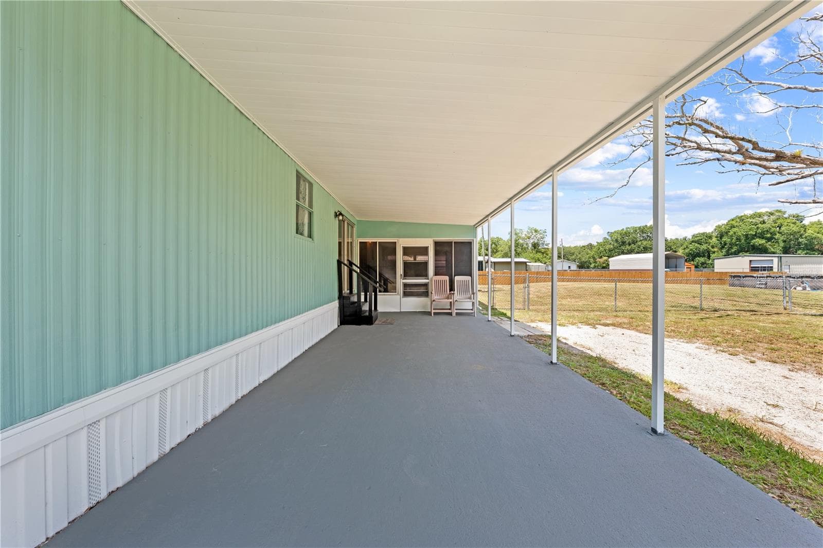 Plenty of room to park your full size vehicle in the shade - 5601 LAKE LIZZIE DR, ST CLOUD