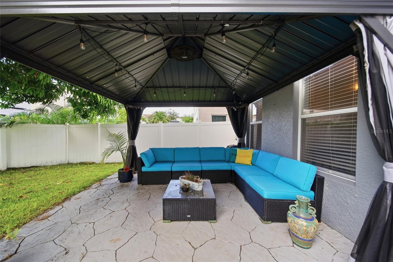 Gazebo with cafe lights and Sectional - 7749 75TH ST N, PINELLAS PARK
