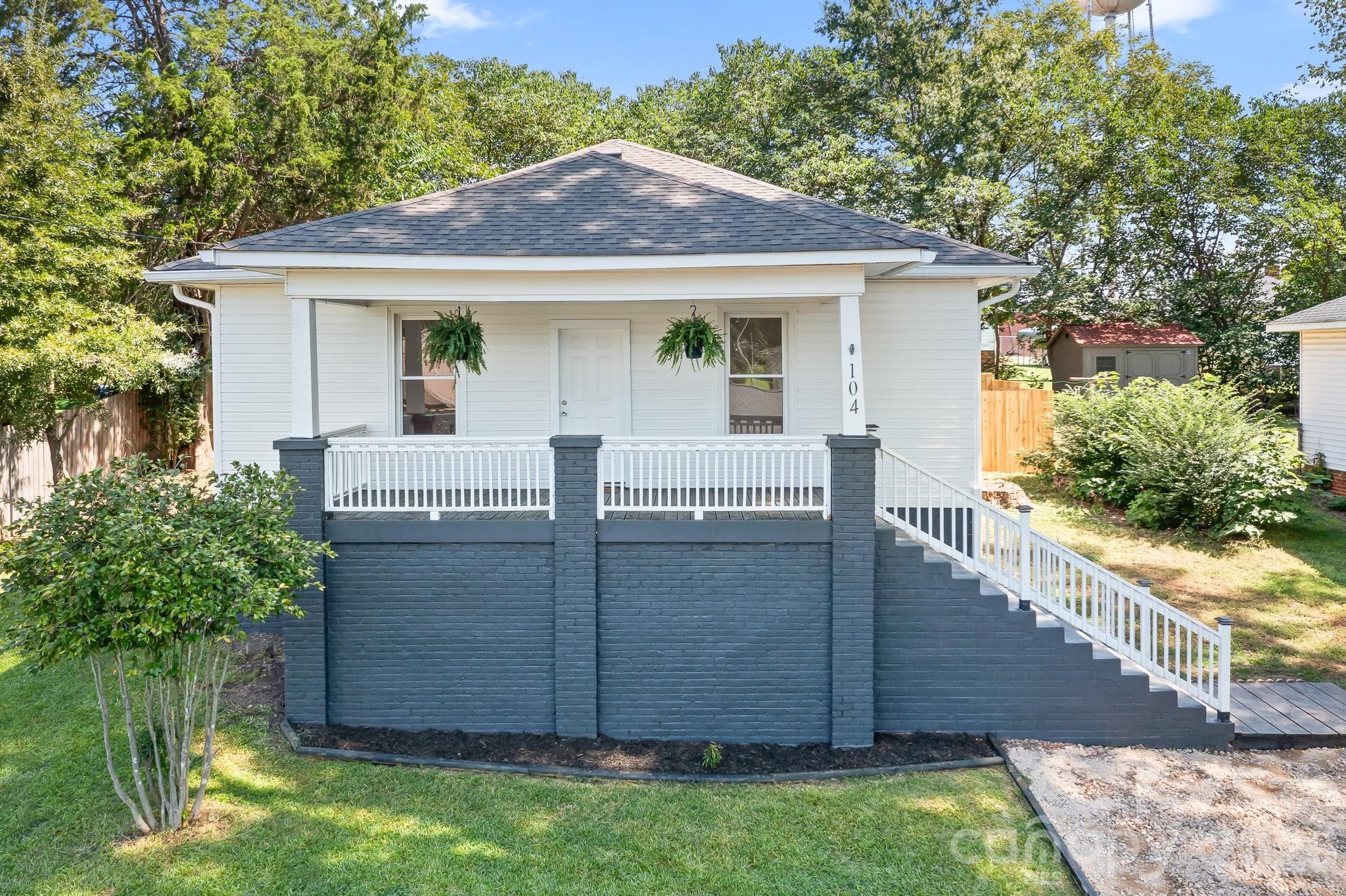 Charming single-story home featuring a welcoming front porch, fresh curb appeal, and an inviting entrance - 104 1st Avenue, China Grove