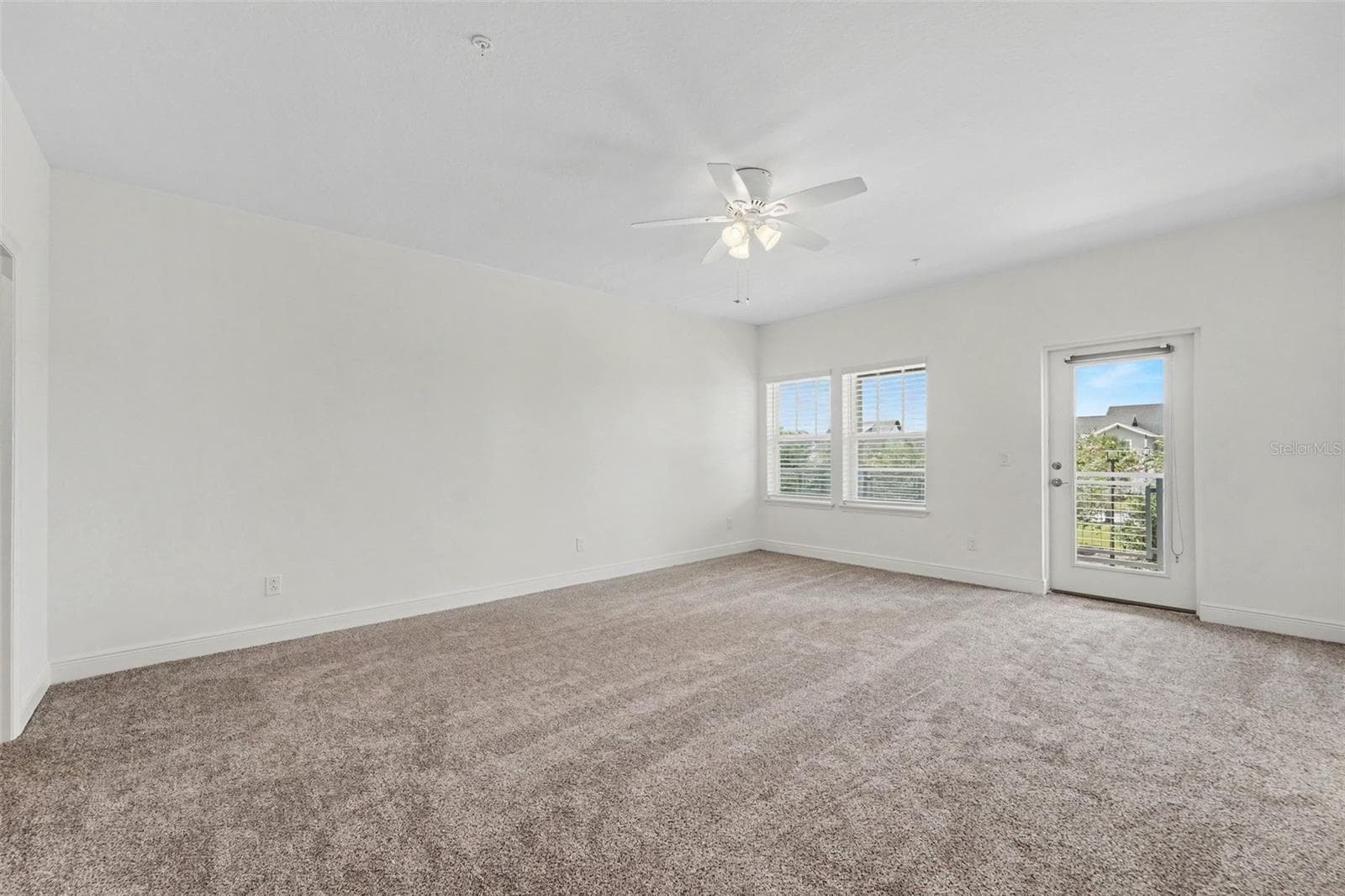 Primary Bedroom accesses door to Balcony - 13129 SALK WAY, ORLANDO