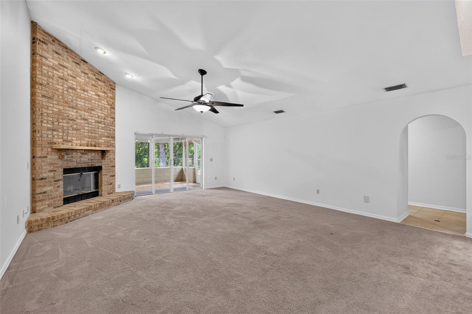 Living Room with Woodburning Fireplace - 37130 COUNTY ROAD 439, EUSTIS