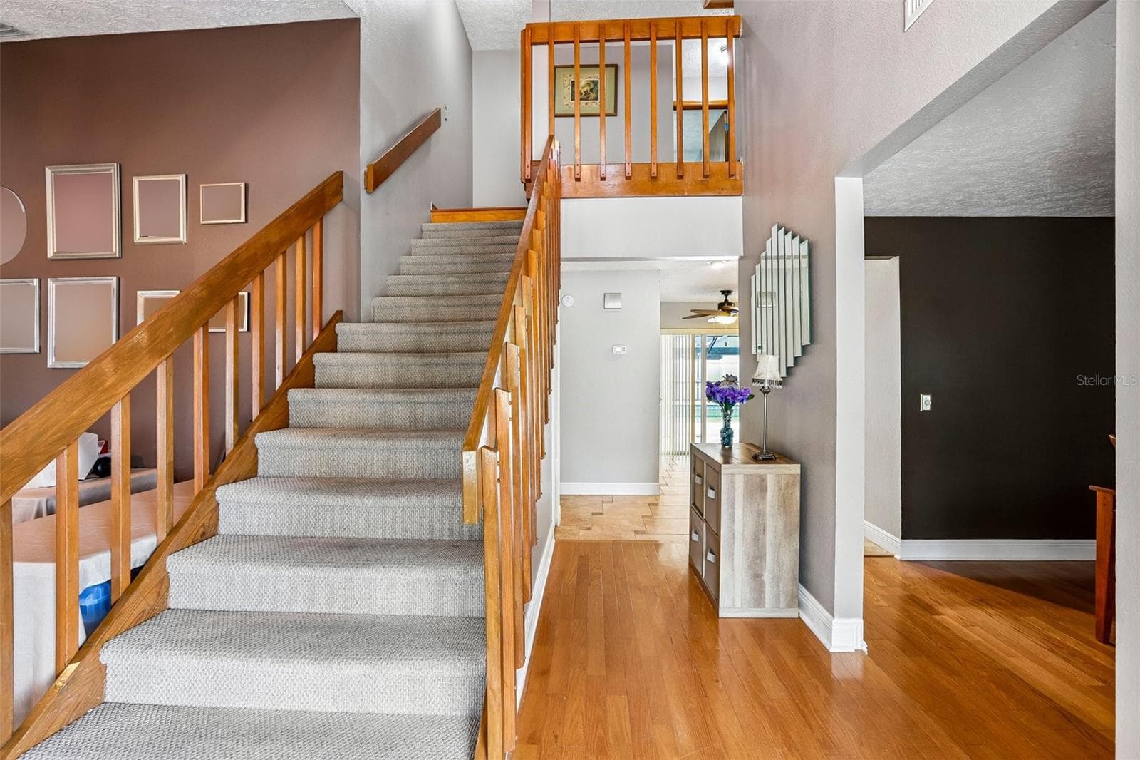 Stairs from foyer to 2nd floor - 1424 DUMONT DR, VALRICO