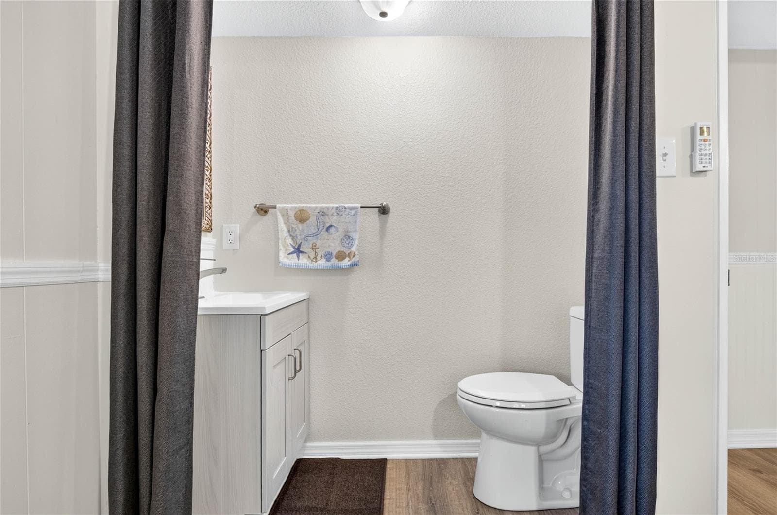 Half bath in the Primary bedroom. - 2000 E BAY DR #33, LARGO