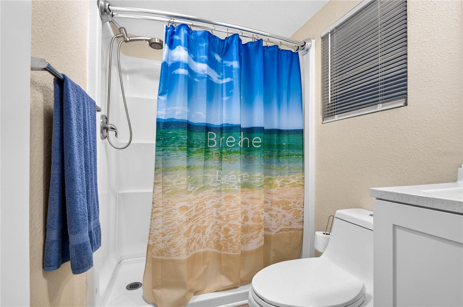 Full bathroom in the hall with walk in shower. - 2000 E BAY DR #33, LARGO
