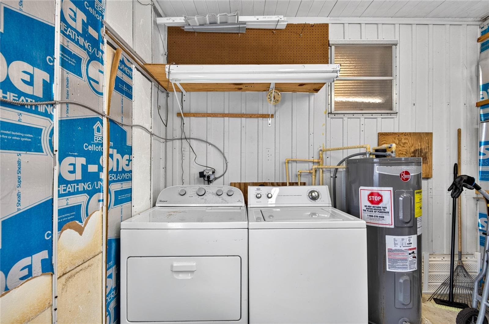 Personal Washer/ Dryer in shed under carport. W/D/Shed conveys. - 2000 E BAY DR #33, LARGO