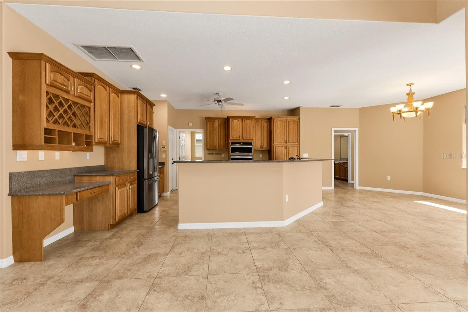 Built in wine rack and desk - 2420 PEBBLE CREEK PL, PORT CHARLOTTE