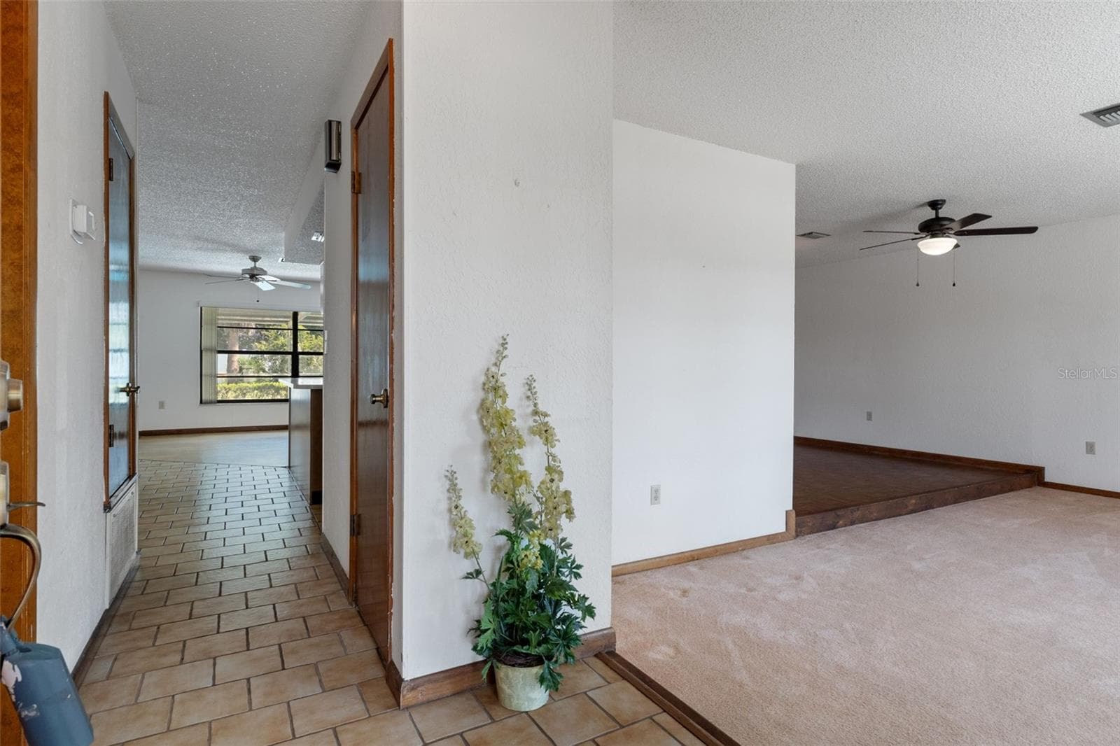 Formal Living Room is on the right - 9009 HEATHER BLVD, WEEKI WACHEE