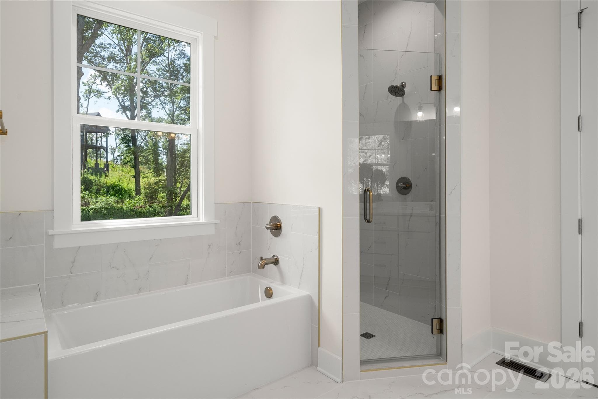 Main-level primary suite bathroom - 227 Northview Drive, Hendersonville