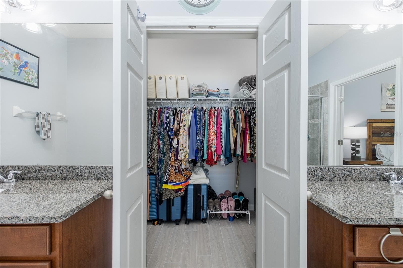 Primary bedroom walk in closet - 2220 PARROT FISH DR, HOLIDAY