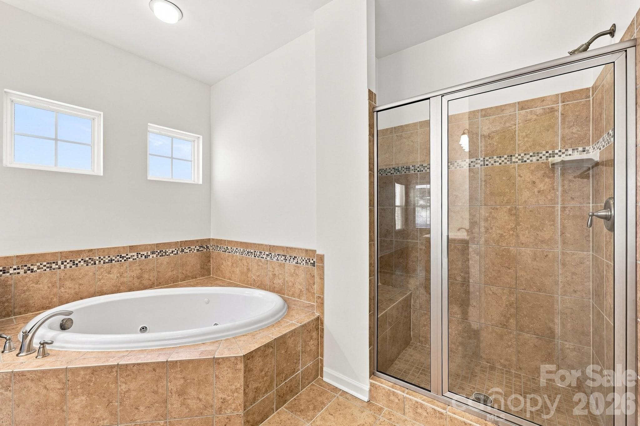 Primary bathroom with jetted tub and separate shower - 593 Harrison Drive NW, Concord