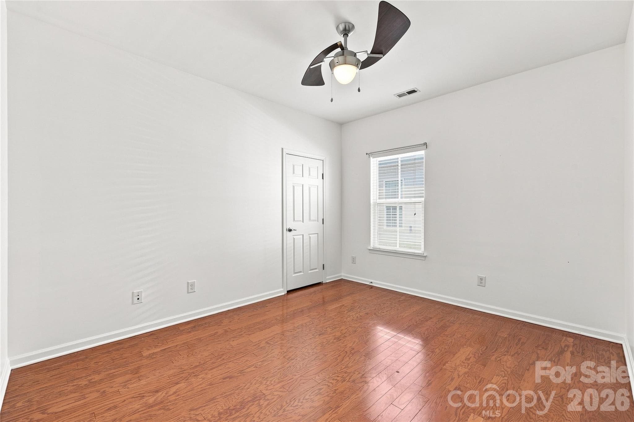 Third bedroom with ceiling fan and closet - 593 Harrison Drive NW, Concord