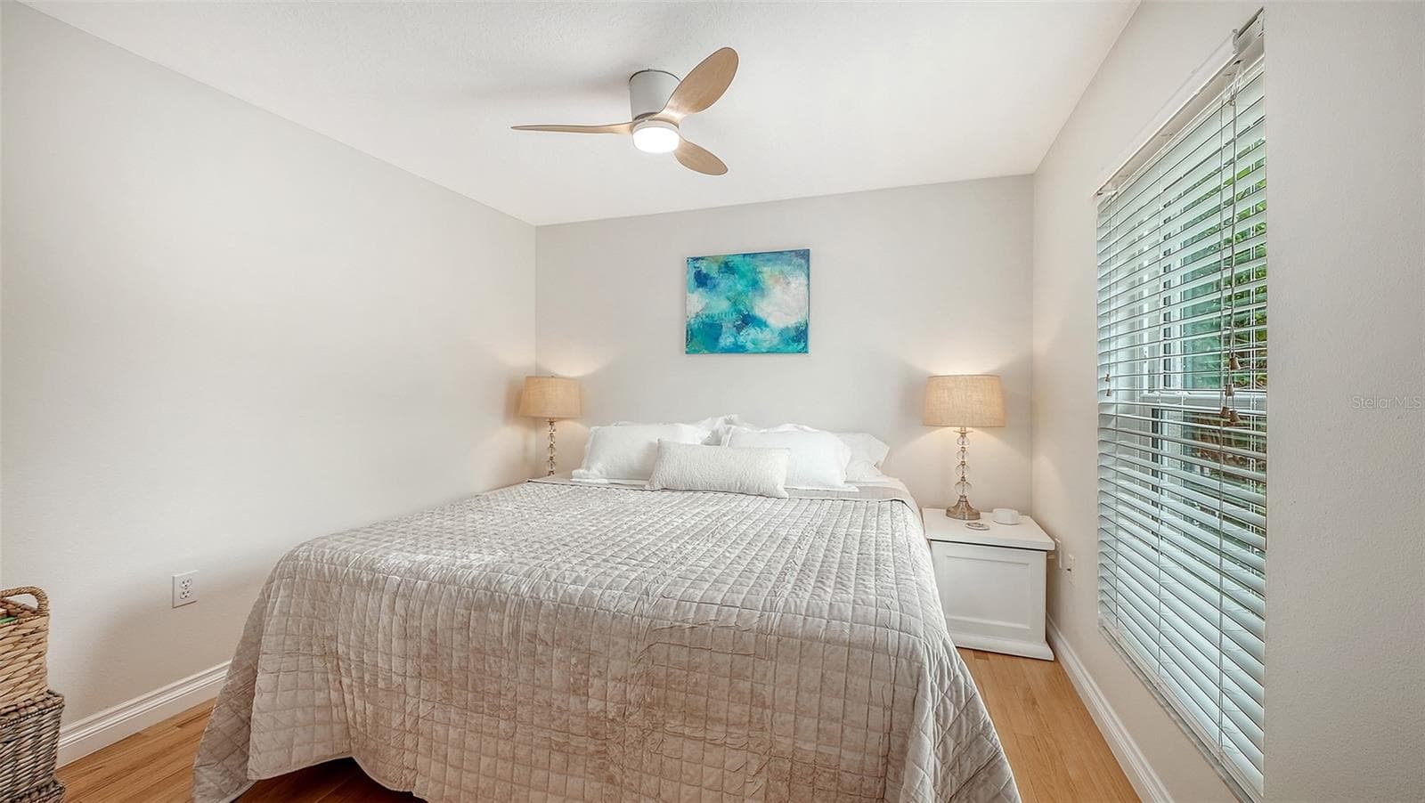 Comfortable bedroom 2 offers hardwood floors, generous natural light, and a tranquil, polished atmosphere. - 1685 6TH ST, SARASOTA