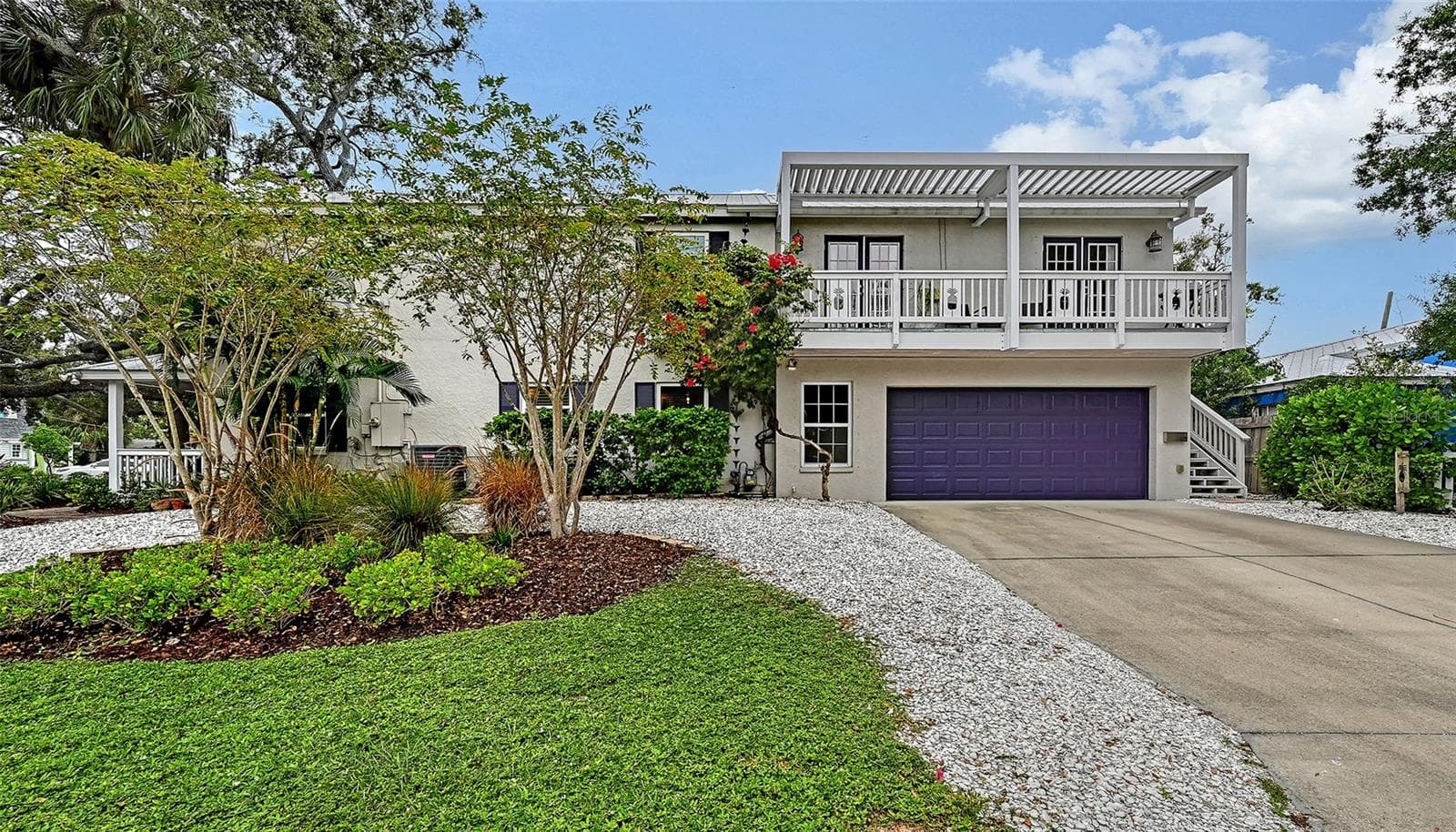 Upstairs, with a separate entrance is The Pineapple Loft - 1685 6TH ST, SARASOTA
