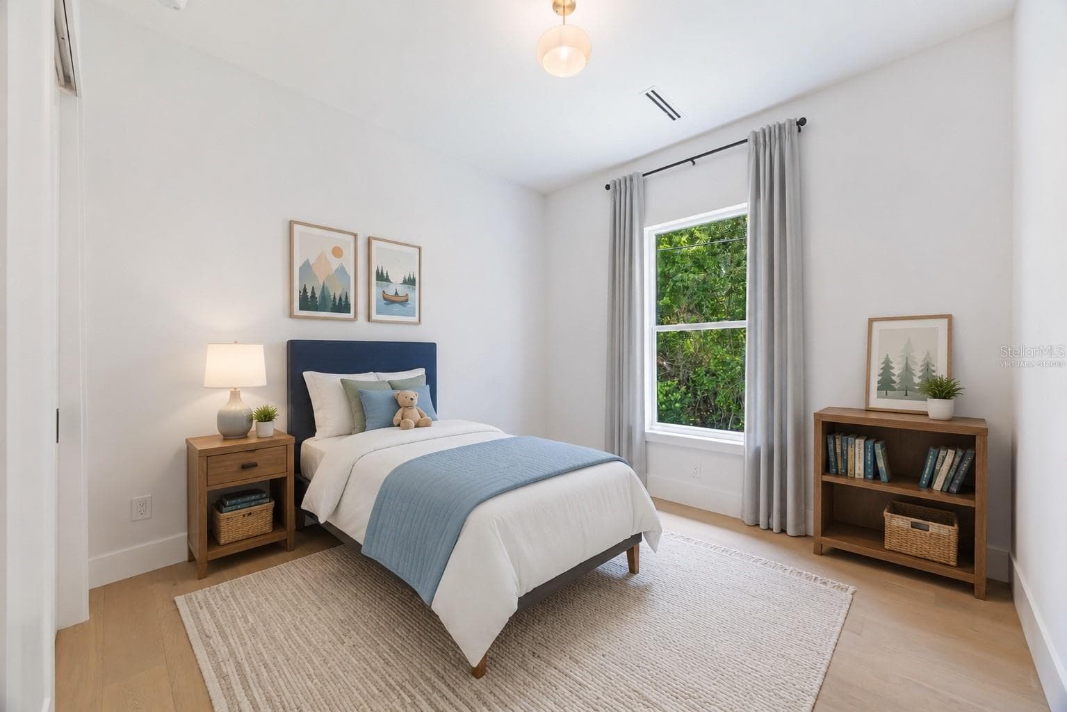Virtually staged. Spacious bedroom 3 with impact-rated window, solid-core door, and convenient access to a full bath. - 1336 HAYS RD, TARPON SPRINGS