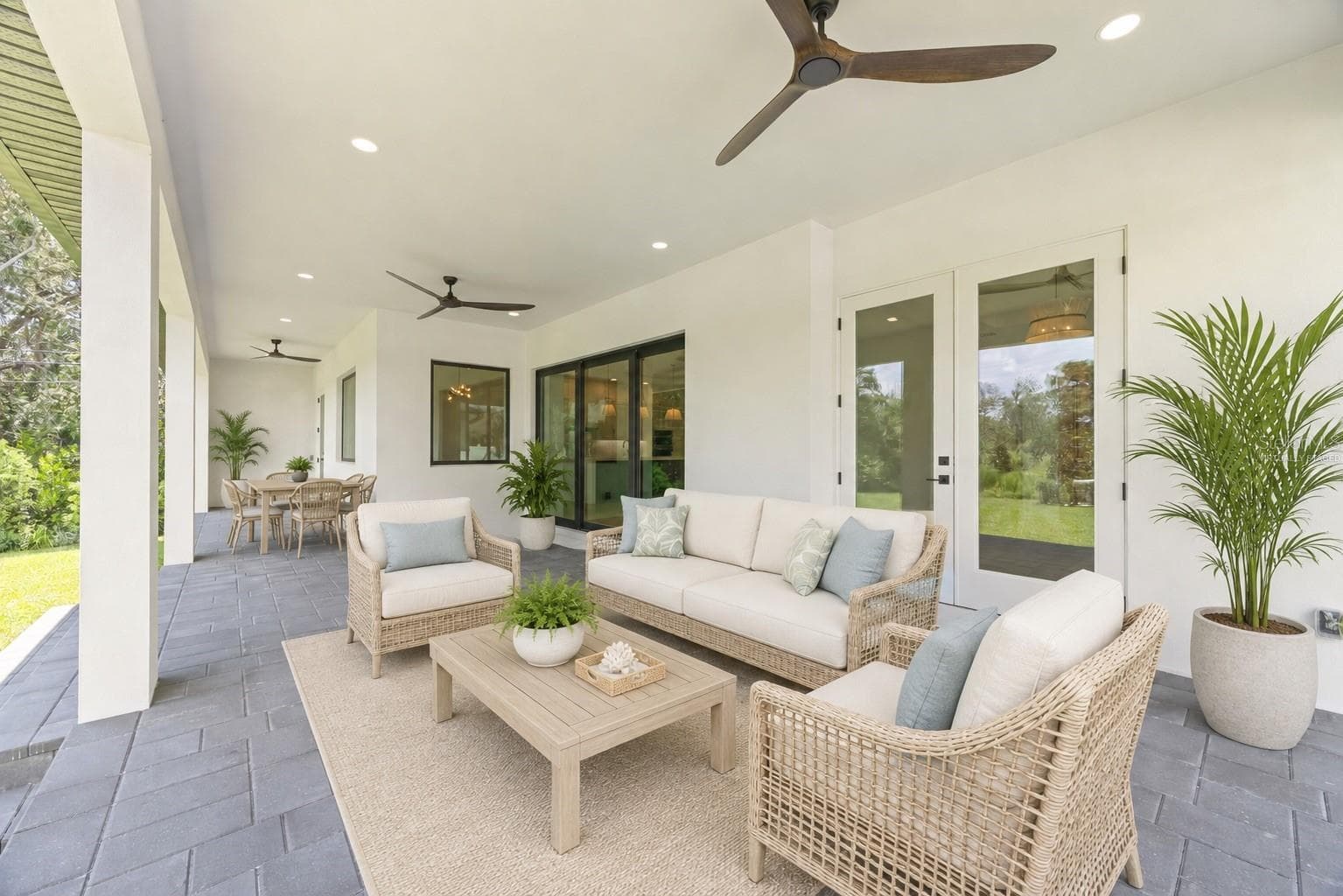 Virtually staged covered paver lanai. - 1336 HAYS RD, TARPON SPRINGS