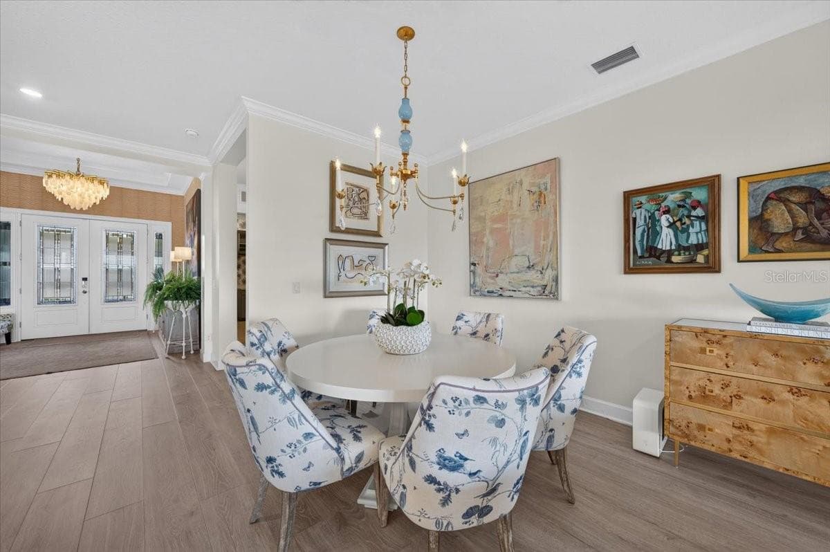 Dining Area - the Chandelier does not convey. - 10168 SILENT NIGHT LN, SARASOTA