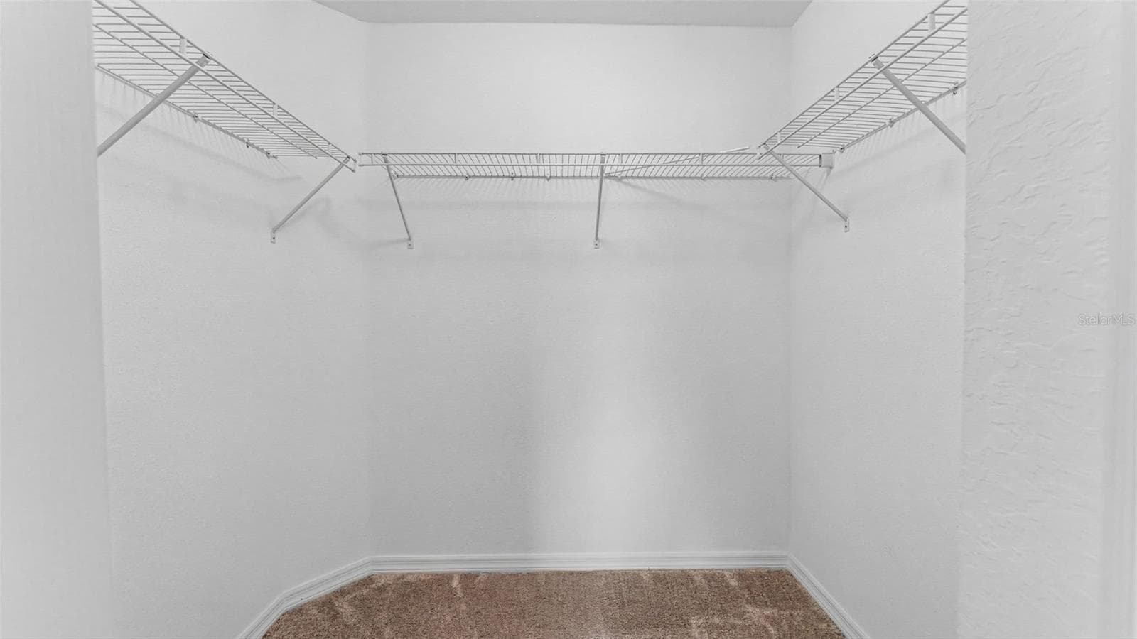 Primary walk in closet - 2048 WINDING RIVER CV, BARTOW
