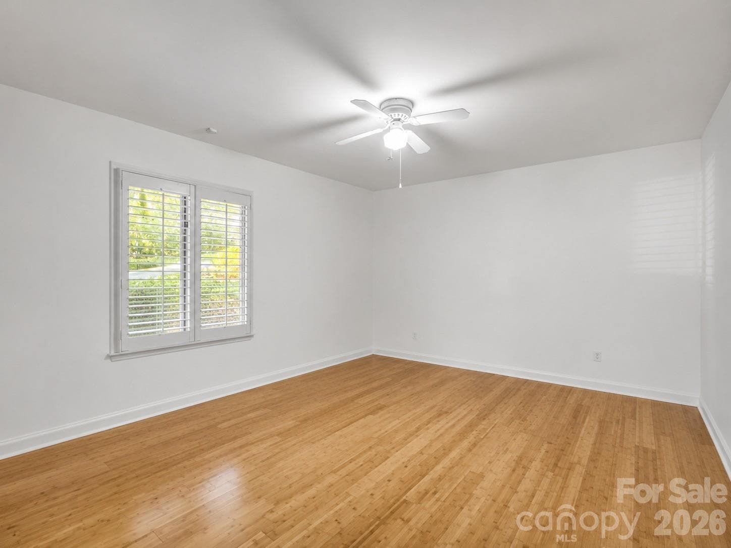 Bedroom #2 with plantation shutters - 335 Melrose Avenue, Tryon