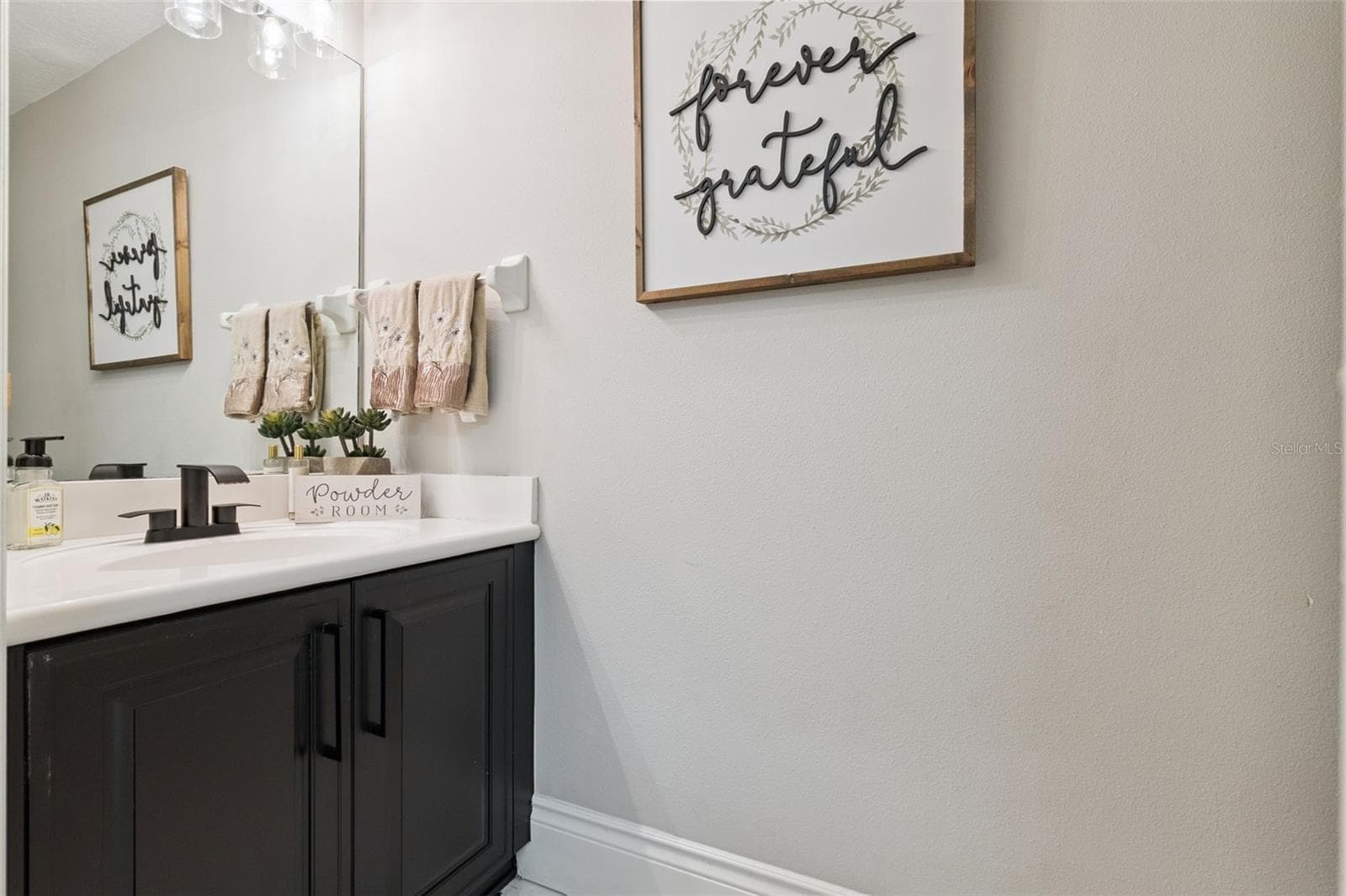 half bath in laundry room - 950 SWEETWATER CLUB BLVD, LONGWOOD