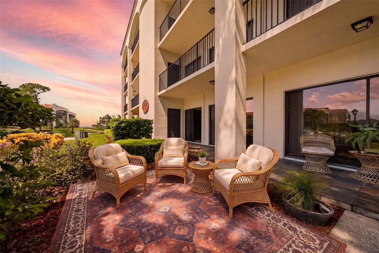 Virtually staged- extended patio - 301 MARINER DR #301, TARPON SPRINGS