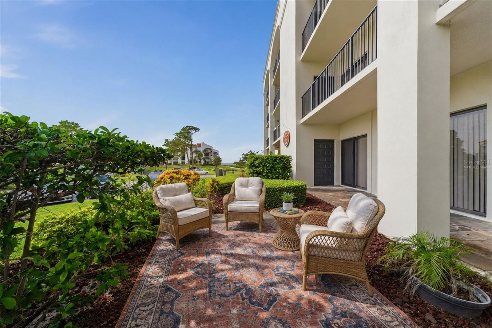 Virtually staged- extended patio - 301 MARINER DR #301, TARPON SPRINGS