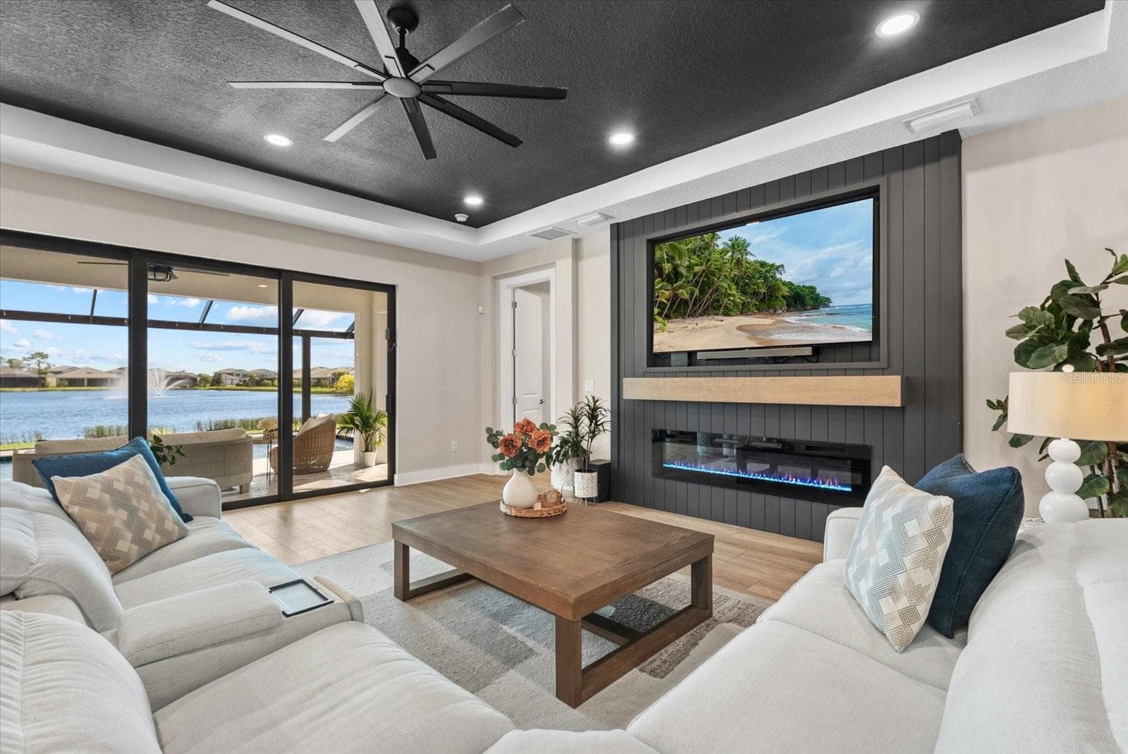 Feature Wall with Electric Fireplace - 12801 MORNING MIST PL, VENICE